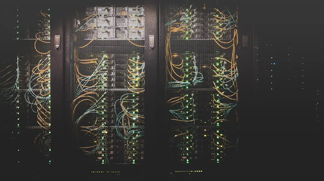 Rows of server racks plugged into large industrial transformers and power conduits