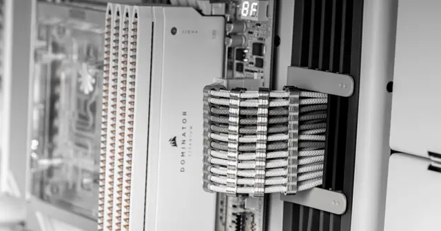 Close-up of server rack components with cables and indicator lights