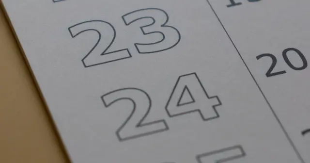 A wall calendar opened to the month of June