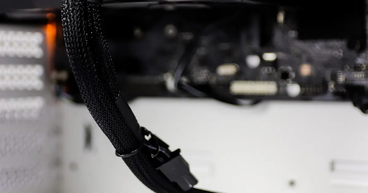 Close-up of computer hardware showing a GPU and motherboard components