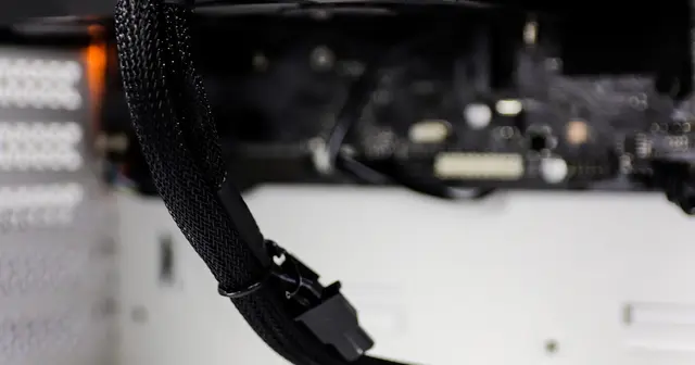 Close-up of computer hardware showing a GPU and motherboard components