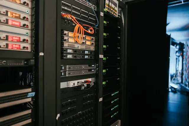 Close-up of server GPUs with blue LED indicators